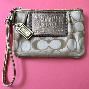 Signature Coach Poppy Wristlet